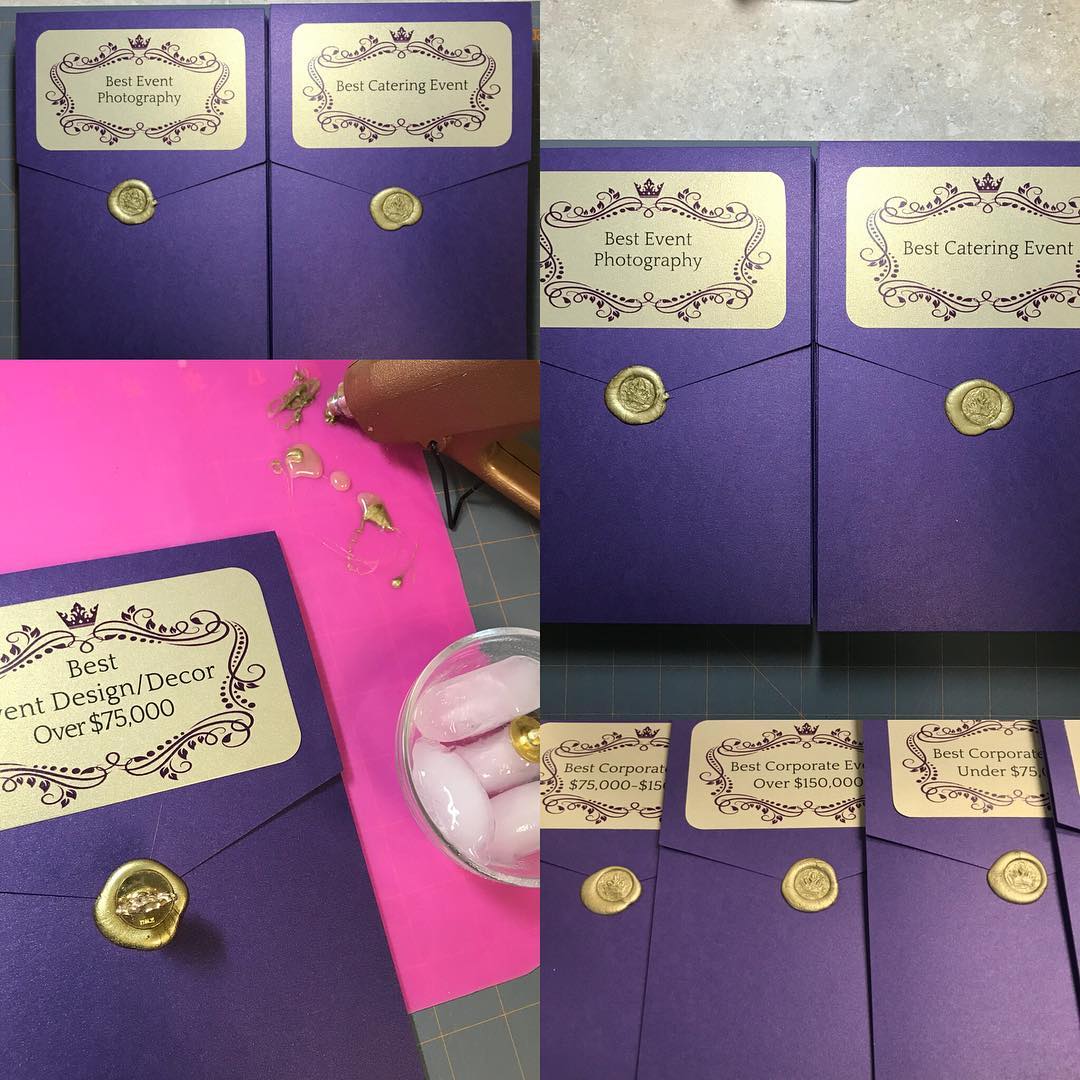 A set of purple and gold envelopes with gold buttons, perfect for Texas wedding invitations or San Antonio wedding invitations.