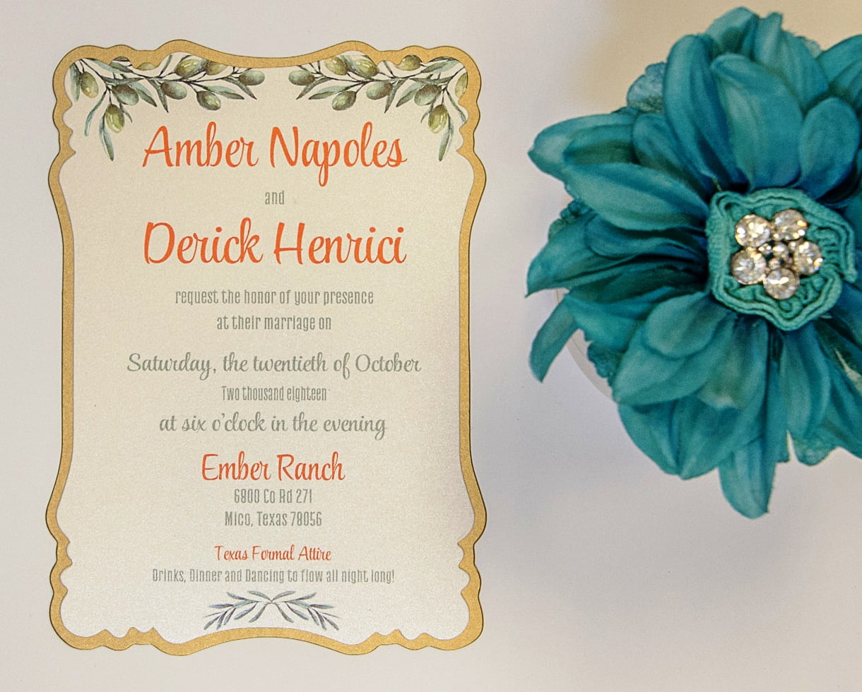 A beautiful wedding invitation featuring a stunning blue flower, available at our San Antonio stationery store.
